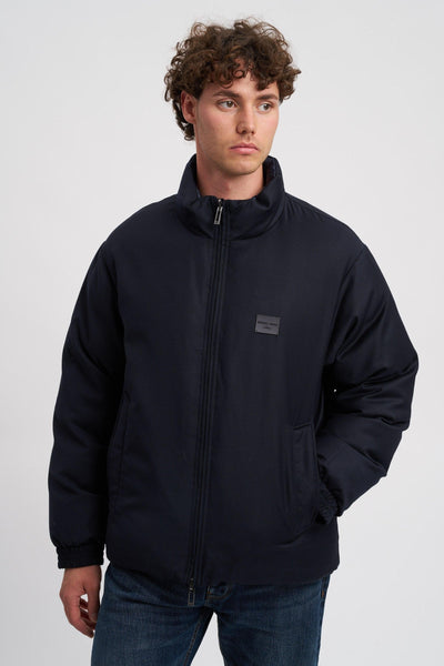 Piumino reversibile in twill misto lana