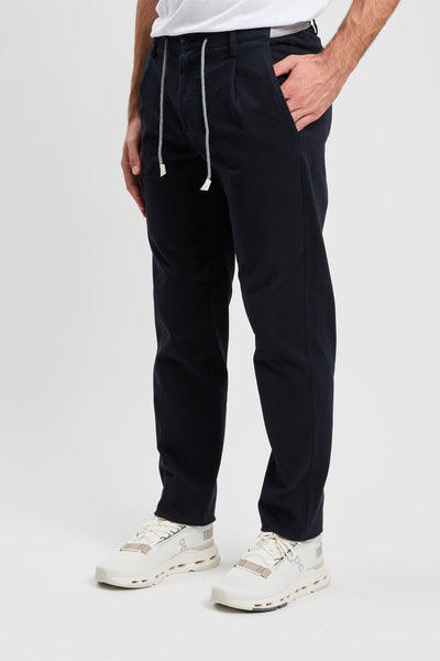 Pantalone con pince in cotone stretch
