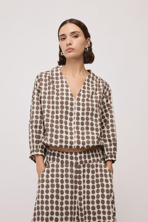 Blusa con scollo a V