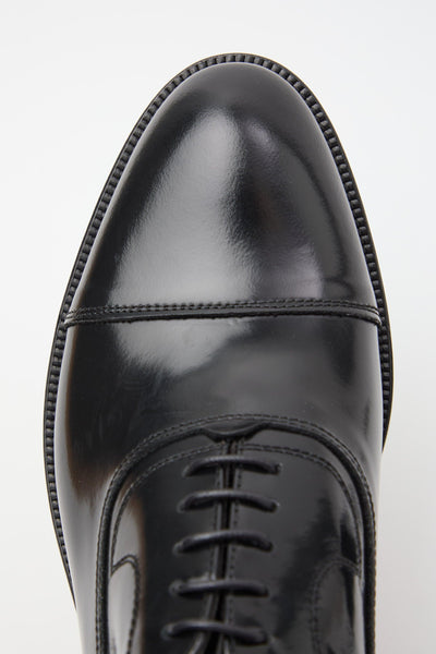 Stringata Nero Uomo
