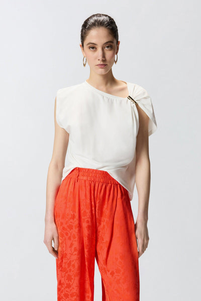 Top in cotone con applicazione in metallo dorato