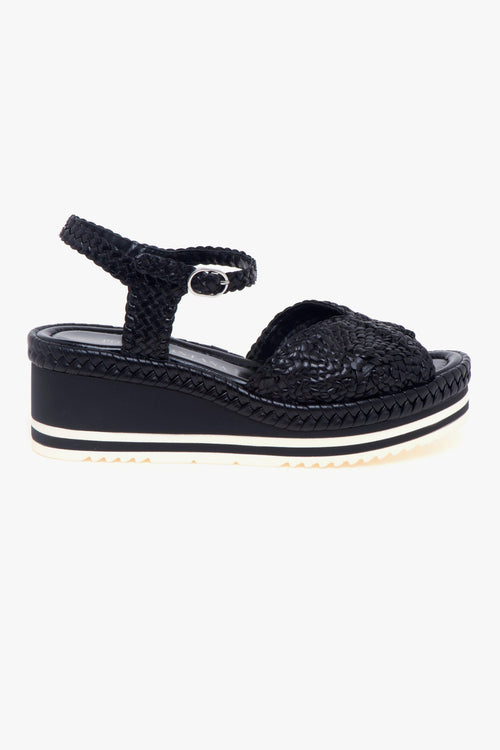 Sandalo in pelle intrecciata con zeppa