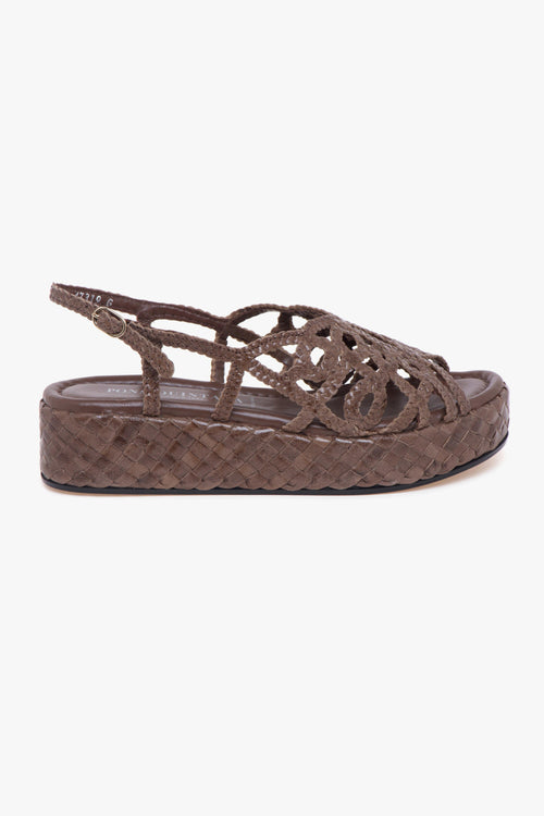 Sandalo in pelle intrecciata con platform