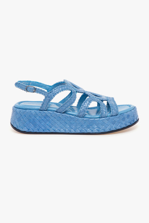 Sandalo flat in pelle intreccata e platform