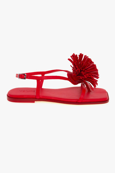 Sandalo flat Vic Matiè in pelle con maxi pon-pon con frange in pelle