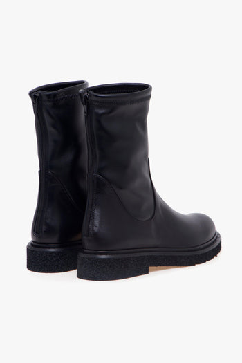 Tronchetto in pelle con gambale stretch, suola in gomma e zip - 3