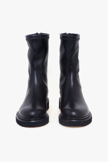 Tronchetto in pelle con gambale stretch, suola in gomma e zip - 5