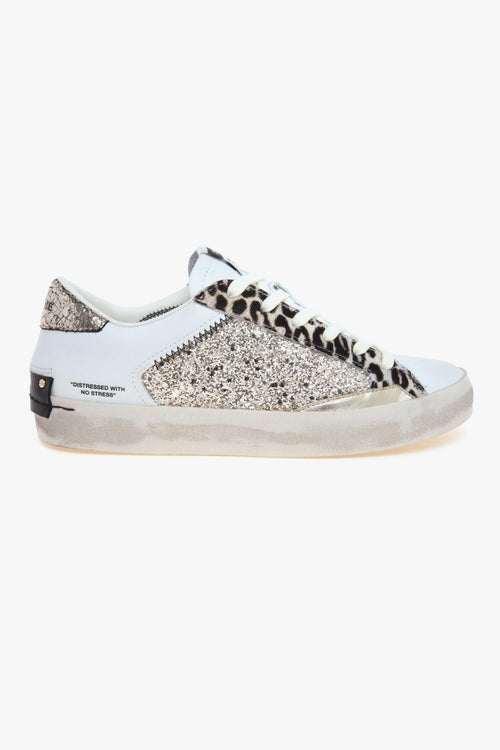 Sneaker Distressed in pelle e glitter con inserti in cavallino bianco maculato