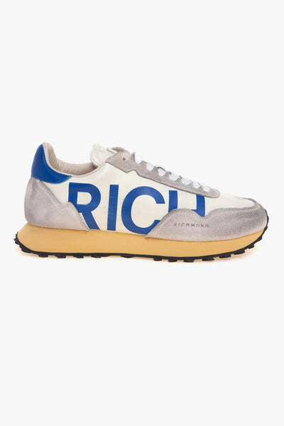Sneaker in pelle con maxi logo laterale a contrasto