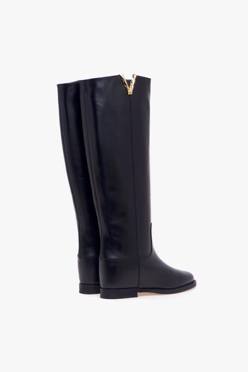 Stivale in pelle con zeppa interna e "V" sfaccettata oro - 3