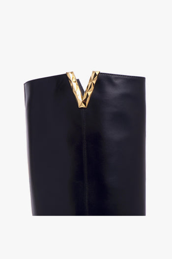 Stivale in pelle con zeppa interna e "V" sfaccettata oro - 4