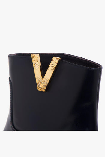 Tronchetto in pelle con zeppa interna e "V" diamante zigrinata - 4