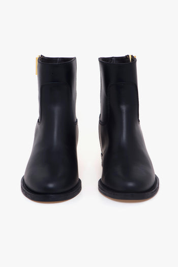 Tronchetto in pelle con zeppa interna e "V" media dorata - 5