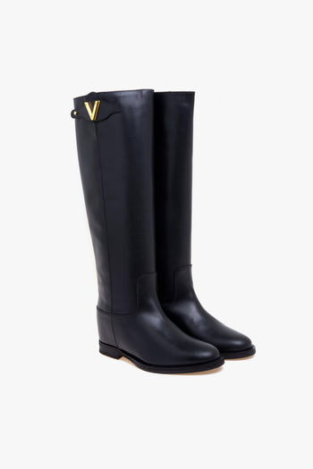 Stivale in pelle con zeppa interna e patta con "V" sul lato - 2