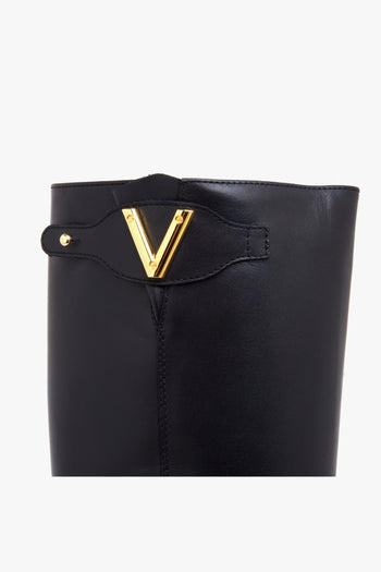 Stivale in pelle con zeppa interna e patta con "V" sul lato - 4