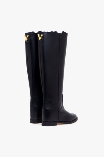 Stivale in pelle con zeppa interna e "V" media applicata dietro - 3