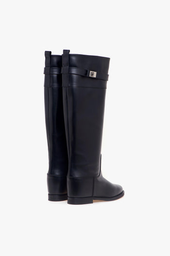 Stivale in pelle con zeppa interna, banda e accessorio lucchetto - 3