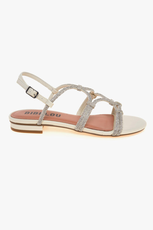 Sandalo basso in pelle con tomaia full-strass