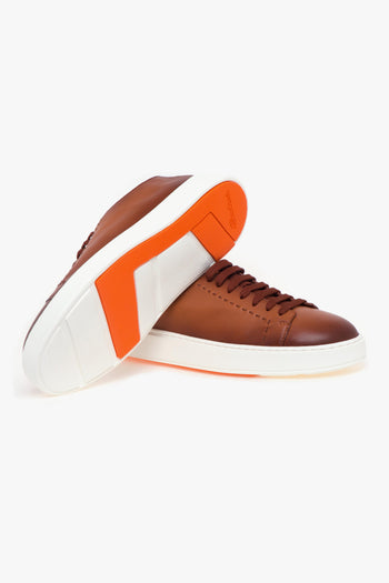 Sneaker in pelle anticata con impunture - 4