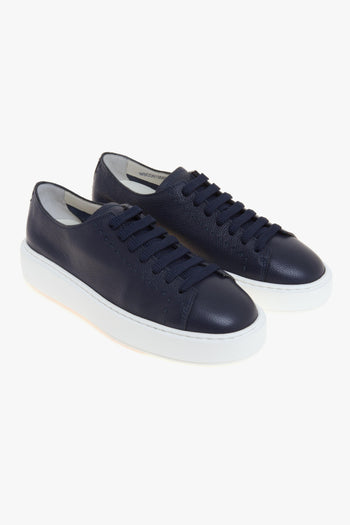 Sneaker in pelle con impunture e suola in gomma - 2