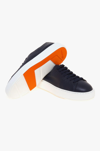 Sneaker in pelle con impunture e suola in gomma - 4