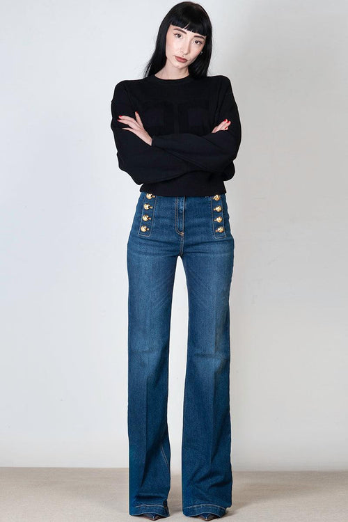 Jeans stretch con bottoniera laterale